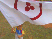 Boy holding the Banner of Peace